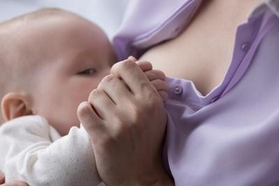 Mother giving a breastfeed for her baby