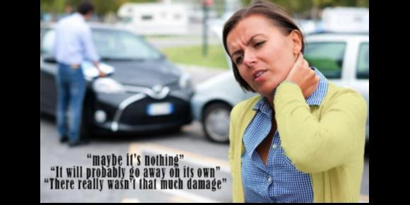 woman grasps her neck in pain following a car crash in Apex, NC  wondering of she has whiplash. Her damaged car is in the background