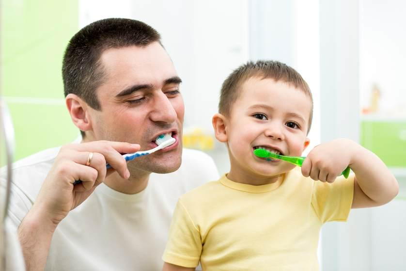 boy brushing teeth