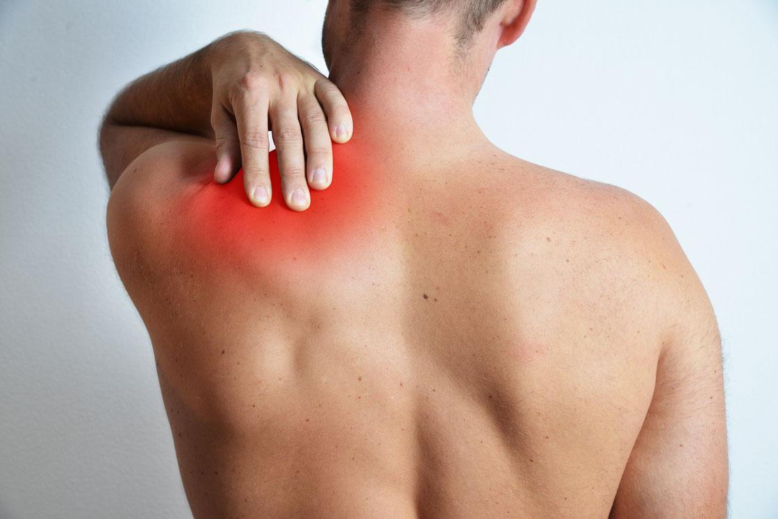 man with shoulder pain