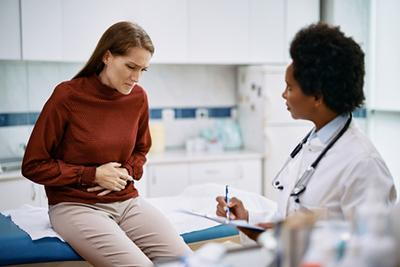 Gastroenterology visit for woman with irritable bowel syndrome