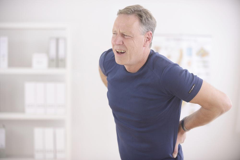 old man with back pain