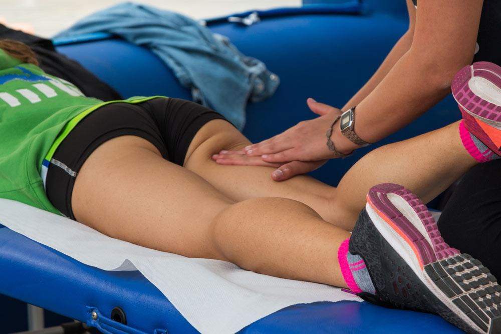 A female doing leg massage
