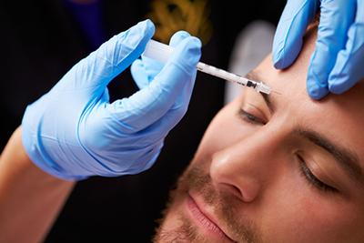 Botox-Procedure-in-a-Man's-Forehead