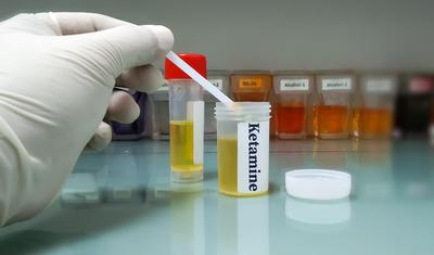 Drops of ketamine concept image.