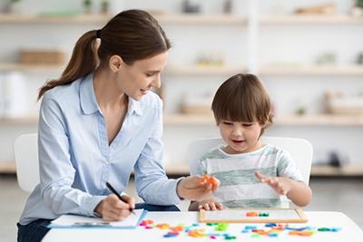 Children's-Doctor-Evaluating-Child-for-Possible-Developmental-Delay