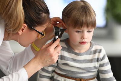 ENT-Specialist-Examining-a-Young-Girl’s-Ear-for-Signs-of-Infection