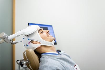 Transcranial-Magnetic-Stimulation-Procedure-Being-Administered-to-Man