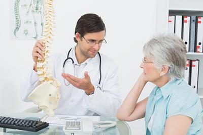 Elderly-Patient-Learning-About-Spine-Changes-from-Osteoporosis