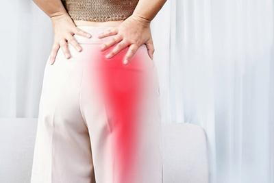 Sciatica pain in red highlights.