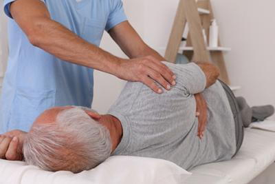 Osteopath-Treating-Client-with-Osteopathy