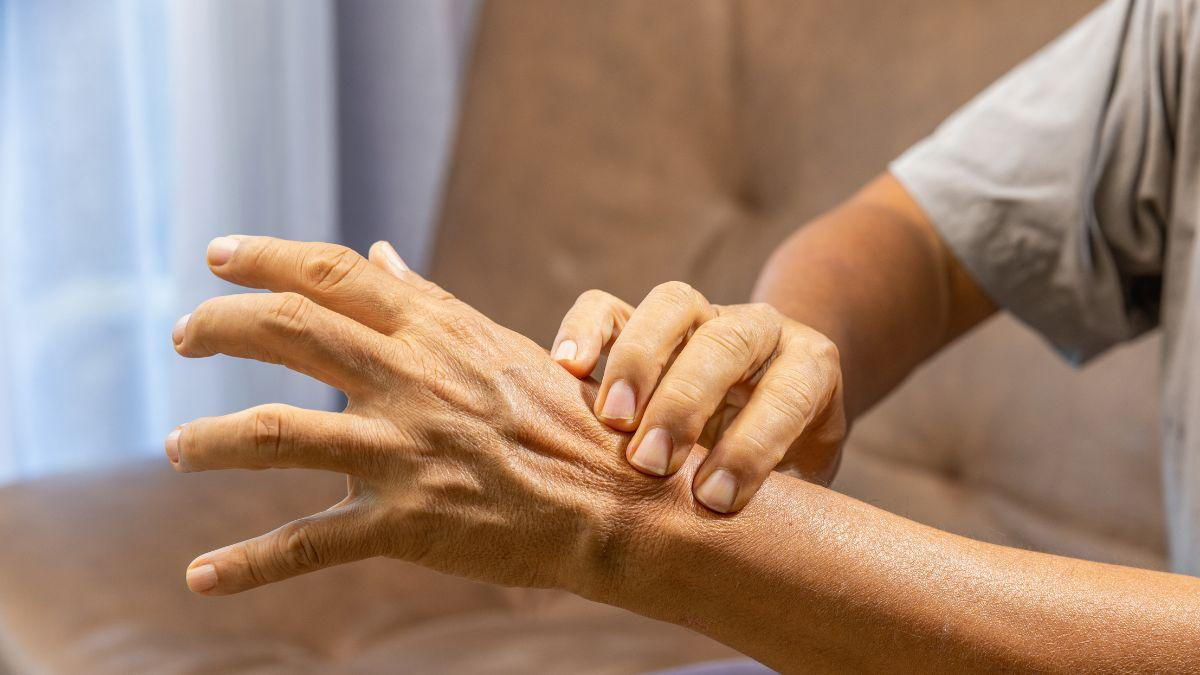 A Person Holding Hand With Wrist Pain