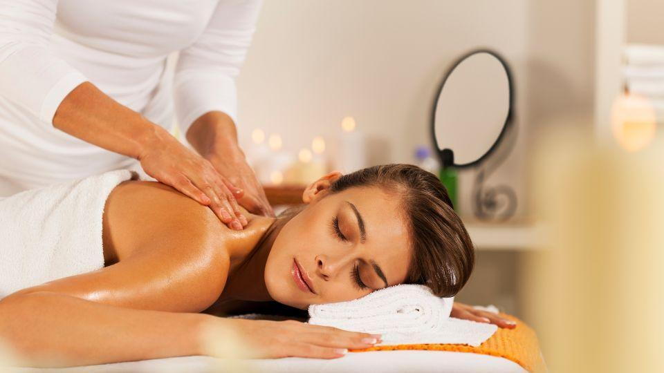 Woman Receiving A Relaxing Back Massage