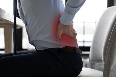 Back pain in an office worker from sitting for long periods