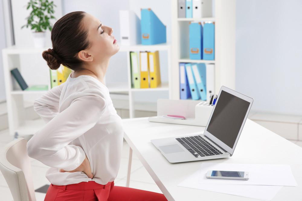 a woman enduring back pain