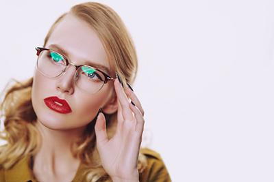 Woman in Eye glasses testing on clinic.