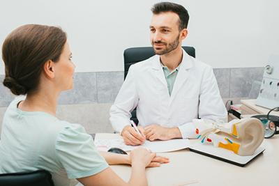 Ear-Nose-and-Throat-Specialist-Talking-About-Clinic-Surgeries