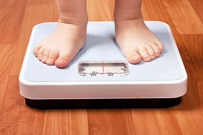Person using measuring Weight