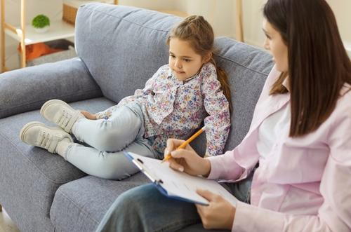 Child participating in an ADHD evaluation session with a pediatrician