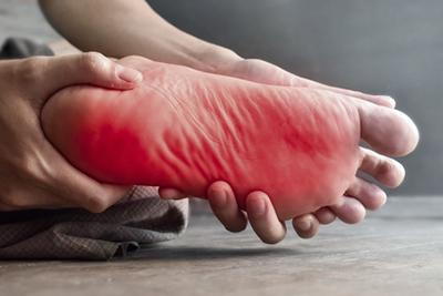 Man-Suffering-from-Foot-Pain