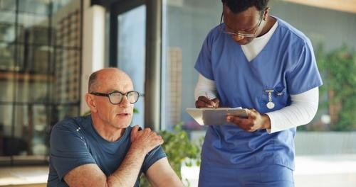 Injured worker visits chiropractor for shoulder pain relief