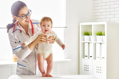 Pediatrician-Examining-a-Baby