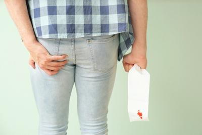 Woman consulting gastroenterologist for colon cancer screening