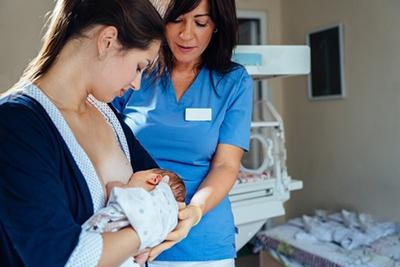 Children's-Doctor-During-Lactation-Consultation-of-a-First-Time-Mom