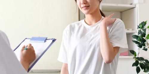 Female client visiting a chiropractor for wellness care