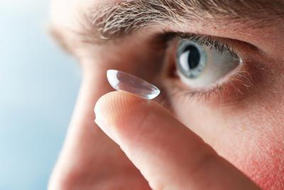 Man-Inserting-Contact-Lenses