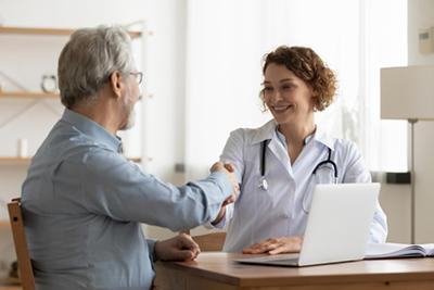 Doctor-shaking-hands-with-the-patients-in-her-clinic