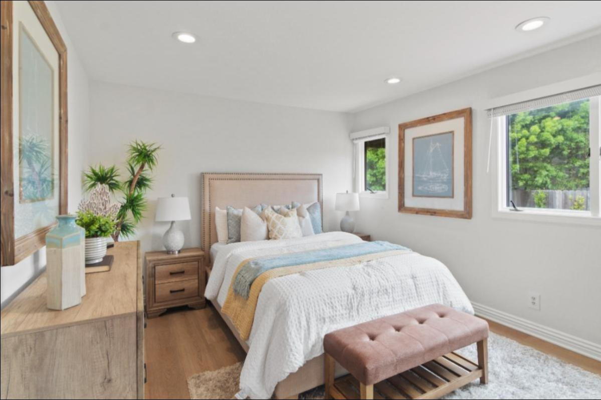 real estate photographer san diego displaying luxury real estate property bedroom with two windows