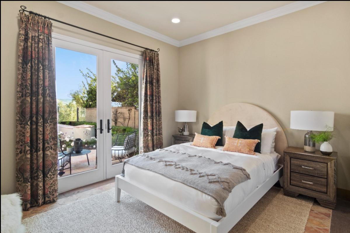 real estate photographer san clemente showcasing luxury real estate property bedroom with french doors