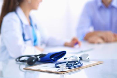 Female doctor to a patient