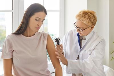 Skin-Doctor-Holding-a-Dermatoscope