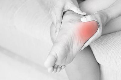 Red highlight indicating plantar fasciitis foot pain