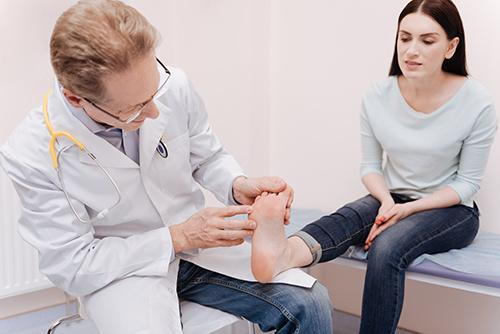 Doctor Checking Toes