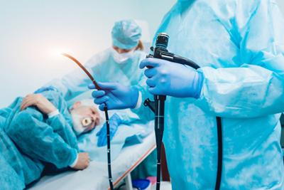 Gastroenterologist-Holding-an-Endoscope