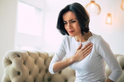 Woman-Suffering-from-Chest-Pain