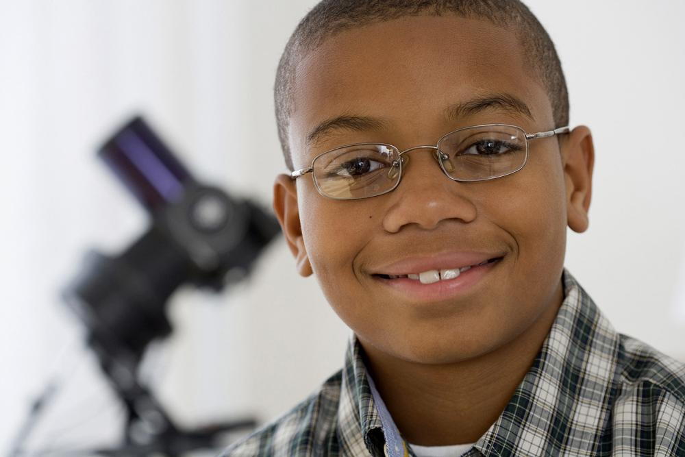 young child wearing his new eyeglasses