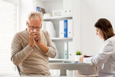 Senior-Man-with-Allergy-Symptoms-Consulting-an-Allergist