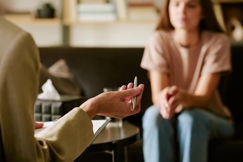 Woman participating in individual therapy with therapist