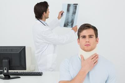Patient-with-Neck-Injury-VIsits-Doctor