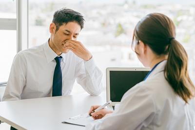 Man-with-Allergy-Symptoms-Visits-an-ENT-Doctor