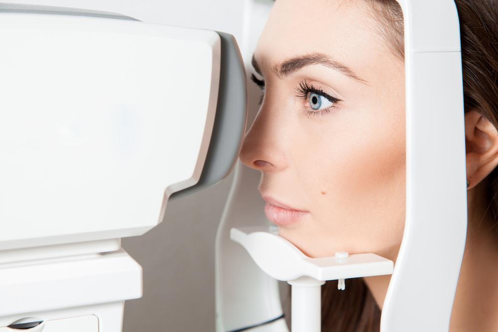 woman receiving an eye exam