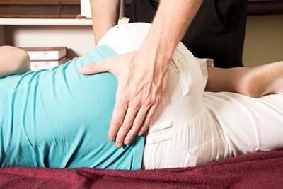 Woman-Undergoes-Chiropractic-Care-for-Hip-Discomfort