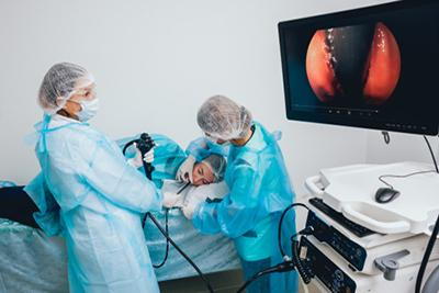 Upper-Endoscopy-Process-in-clinic-with-monitor-and-doctors.
