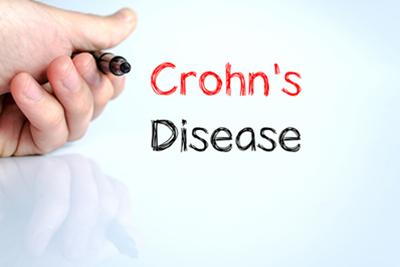 Medical term Crohn’s disease written in bold marker ink