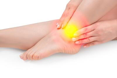 Patient with inflamed ankle joint from arthritis