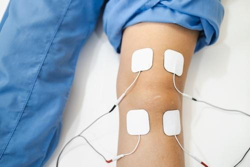 Physical therapy session with EMS after knee operation